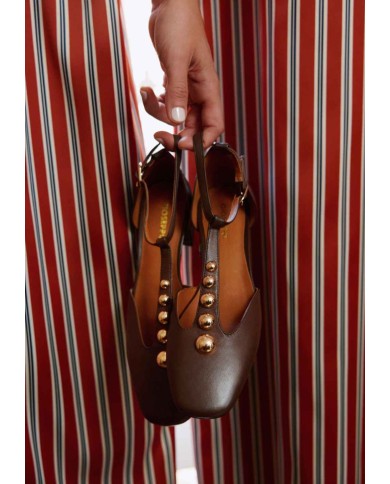GIOSEPPO TACCHI DONNA CON BORCHIE