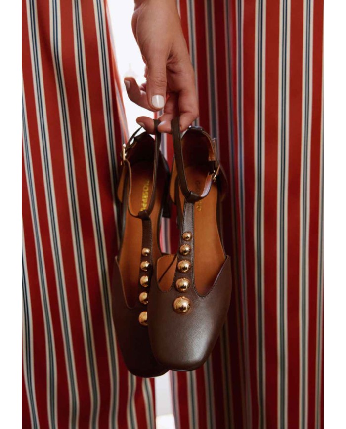 GIOSEPPO TACCHI DONNA CON BORCHIE